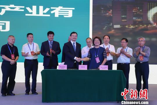 研討會現(xiàn)場圖?！■暮陚?攝
