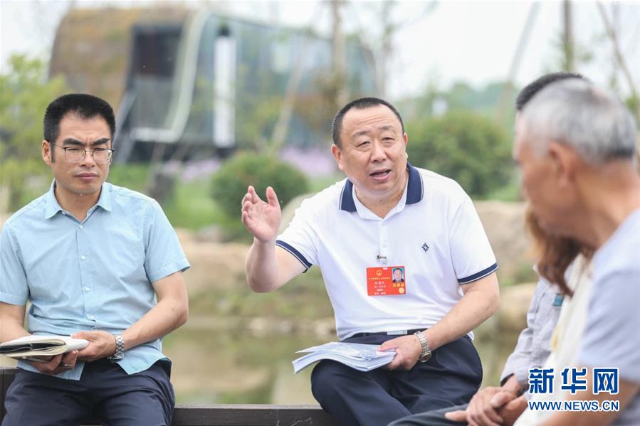 （新華全媒頭條·兩會精神看落實·圖文互動）（2）整體謀劃、系統(tǒng)升級、全面提升——落實全國兩會精神織牢織密公共衛(wèi)生防護網(wǎng)